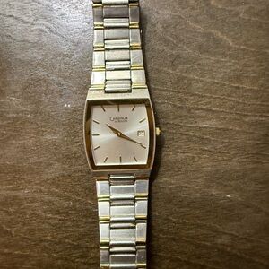 Classic Silver and Gold Men's Watch by Caravelle